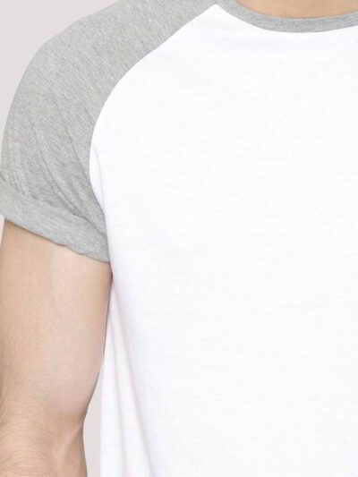 Close-up on a smooth, finely-knitted t-shirt. Notice the tight stitching and soft drape, hints of premium cotton in solid col
