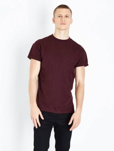 Burgundy t-shirt close-up. Fine custom embroidery detail on soft, textured cotton knit. High-quality short-sleeve top. - View