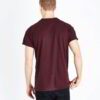 Burgundy t-shirt close-up. Fine custom embroidery detail on soft, textured cotton knit. High-quality short-sleeve top. - View