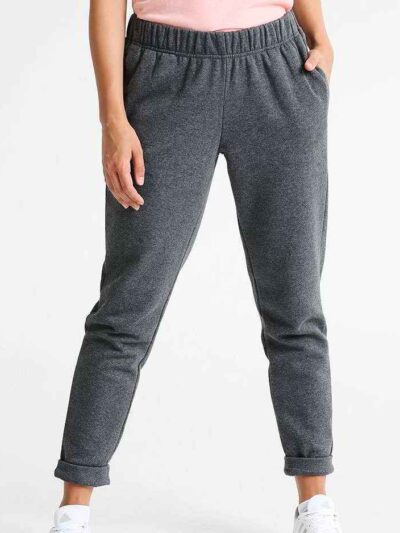 Crimson and charcoal football training tracksuit. Close-up shows breathable fabric, reinforced stitching. Jacket and pants se