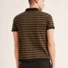 Close-up: premium polo shirts in soft, breathable fabric. Fine stitching, subtly textured. Ideal corporate apparel in various