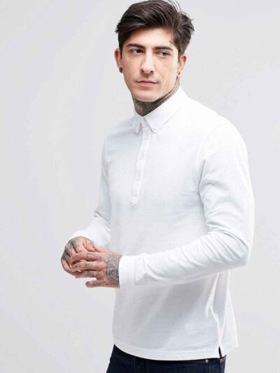 Close-up of a premium navy polo shirt. Notice the finely knit fabric, reinforced stitching, and clean, professional silhouett