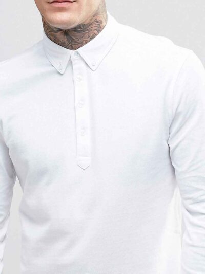 Close-up of a premium navy polo shirt. Notice the finely knit fabric, reinforced stitching, and clean, professional silhouett