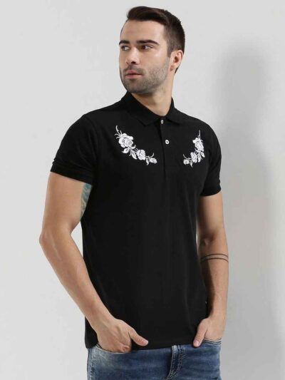 Close-up of a well-stitched polo shirt. Notice the soft pique knit fabric, short sleeves and neat button placket. Ideal for b