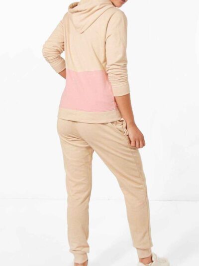 Women's hooded tracksuit, soft brushed fleece texture, custom stitching detail. Adjustable drawstring hood, relaxed fit. Note