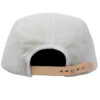 Soft suede leather jet cap in a rich brown hue. Note the subtle stitching details & classic five-panel design, perfect for ev