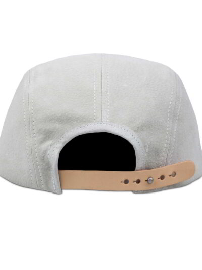 Soft suede leather jet cap in a rich brown hue. Note the subtle stitching details & classic five-panel design, perfect for ev