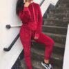 Luxurious velvet joggers set. Close-up shows rich texture, tailored fit, and subtle stitching. Perfect activewear tracksuit f