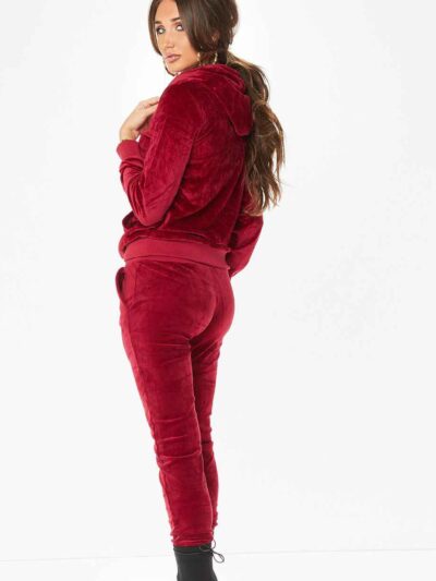 Luxurious velvet joggers set. Close-up shows rich texture, tailored fit, and subtle stitching. Perfect activewear tracksuit f