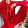 Luxurious velvet joggers set. Close-up shows rich texture, tailored fit, and subtle stitching. Perfect activewear tracksuit f