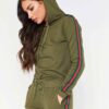 Khaki hoodie tracksuit with side stripe detail. Soft fleece texture, pullover style. Ribbed cuffs and hem. Quality stitching