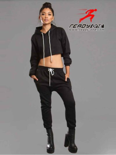 Black women's sweatsuit. Soft fleece knit, ribbed cuffs & waistband. Relaxed fit, drawstring hoodie, visible topstitching. Co