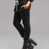 Black women's sweatsuit. Soft fleece knit, ribbed cuffs & waistband. Relaxed fit, drawstring hoodie, visible topstitching. Co