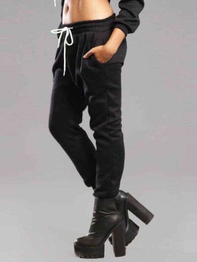 Black women's sweatsuit. Soft fleece knit, ribbed cuffs & waistband. Relaxed fit, drawstring hoodie, visible topstitching. Co