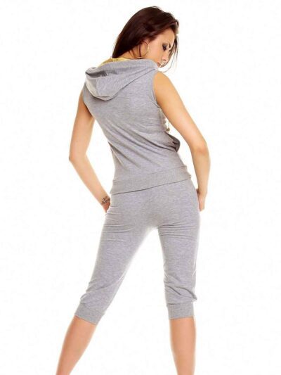 Form-fitting women's sweatsuit featuring a front zipper closure. Soft fabric with visible stitching details. Hints of a bold