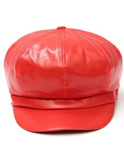 Close-up of a stylish snapback cap featuring a rich leather patch. Notice the textured fabric, intricate stitching, and class