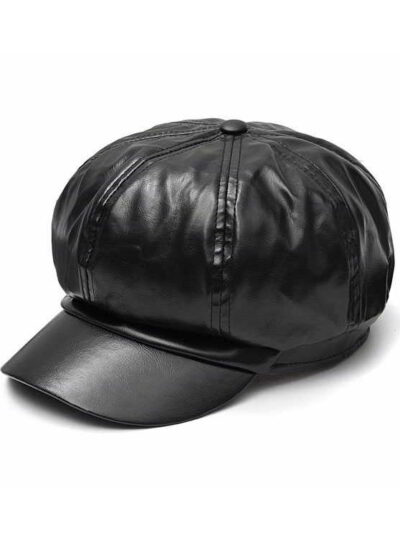 Close-up of a stylish snapback cap featuring a rich leather patch. Notice the textured fabric, intricate stitching, and class