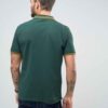 Close-up of a lightweight polo shirt, likely polyester knit. Bright, fully sublimated design with fine stitching visible at t