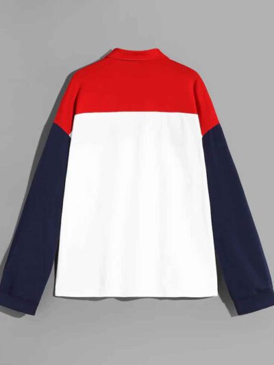 Color block polo shirt with long sleeves. Notice soft cotton-poly blend texture and clean, sturdy stitching. Athletic wear. -
