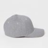 Grey men's cap with subtle textured fabric. Curved brim, clean stitching. Adjustable back closure. Casual, understated style.