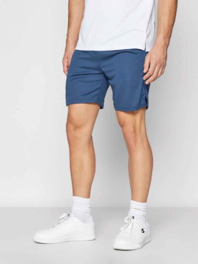 Men's gym set: breathable athletic shorts and fitted tee. Notice fine stitching, soft-touch fabric, and subtle color gradient