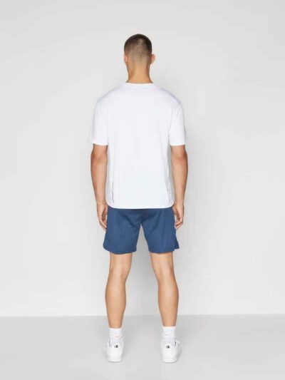 Men's gym set: breathable athletic shorts and fitted tee. Notice fine stitching, soft-touch fabric, and subtle color gradient