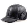 Leather driving cap with plush fleece lining. Warm winter hat, flat style, ear flaps. Fine stitching detail visible on smooth