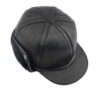 Leather driving cap with plush fleece lining. Warm winter hat, flat style, ear flaps. Fine stitching detail visible on smooth