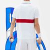 Men's sports polo shirt featuring colorful blocks design and custom embroidered logo. Fabric has a soft, breathable texture w