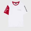 Men's crewneck tee showing custom design area. Soft cotton texture, reinforced stitching. Solid color backdrop highlights per