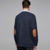 Men's polo shirt, classic fit, light blue pique knit fabric. Notice the neat collar stitching and short sleeves. Soft texture