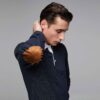 Men's polo shirt, classic fit, light blue pique knit fabric. Notice the neat collar stitching and short sleeves. Soft texture