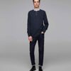 Men's polo shirt, classic fit, light blue pique knit fabric. Notice the neat collar stitching and short sleeves. Soft texture