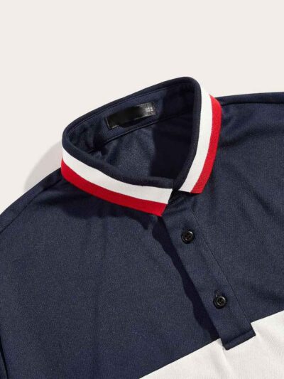 Classic short sleeve polo shirt in a rich blue hue; fine cotton knit texture with neat, custom embroidery detail on the chest