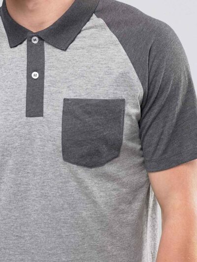 Men's slim fit polo shirt, fine knit texture, pique weave, crisp collar, button placket. Subtle heather grey hints. Professio