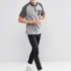 Men's slim fit polo shirt, fine knit texture, pique weave, crisp collar, button placket. Subtle heather grey hints. Professio