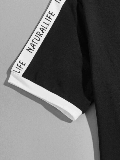 White t-shirt with diamond print and letter tape trim. Ribbed neck & sleeves. Soft cotton texture, clean stitching detail. -
