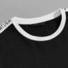 White t-shirt with diamond print and letter tape trim. Ribbed neck & sleeves. Soft cotton texture, clean stitching detail. -