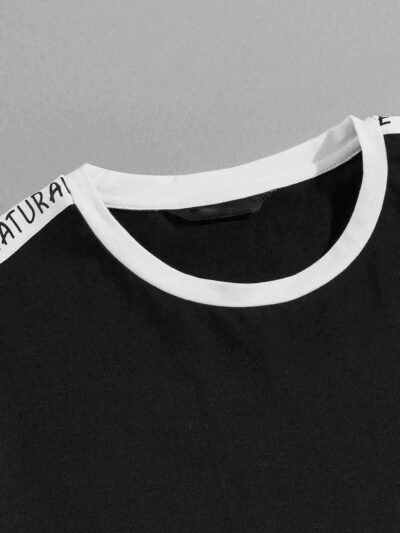 White t-shirt with diamond print and letter tape trim. Ribbed neck & sleeves. Soft cotton texture, clean stitching detail. -