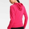 Raglan sleeve hooded tracksuit. Heathered knit, soft texture. Detailed stitching highlights modern design. Sporty loungewear