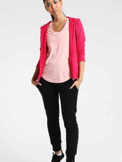 Raglan sleeve hooded tracksuit. Heathered knit, soft texture. Detailed stitching highlights modern design. Sporty loungewear