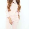 Nude loungewear set. Soft, slightly fuzzy texture. Front zipper pullover and matching pants. Delicate stitching. Comfortable