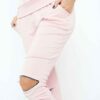 Nude loungewear set. Soft, slightly fuzzy texture. Front zipper pullover and matching pants. Delicate stitching. Comfortable