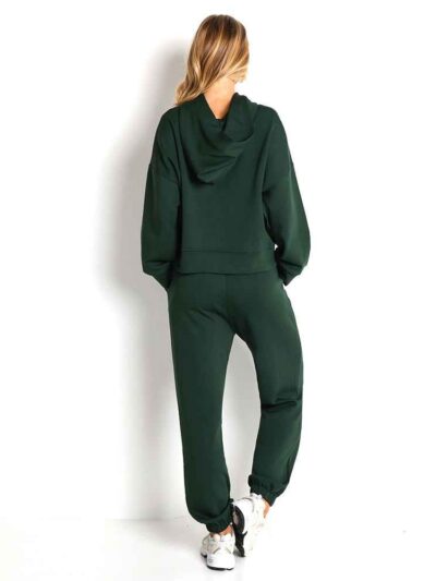 Women's tracksuit set. Soft, breathable fabric with subtle sheen. Athletic fit, clean stitching. Quick-dry sweatpants and jac