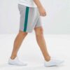 Lightweight resort shorts in a tropical print, featuring a comfortable elastic waistband and clean, durable stitching. Ideal