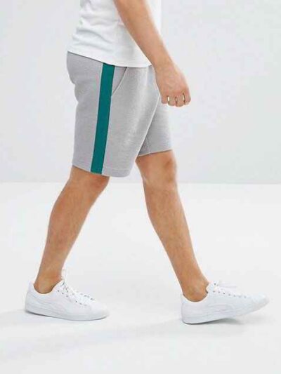 Lightweight resort shorts in a tropical print, featuring a comfortable elastic waistband and clean, durable stitching. Ideal