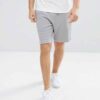 Lightweight resort shorts in a tropical print, featuring a comfortable elastic waistband and clean, durable stitching. Ideal