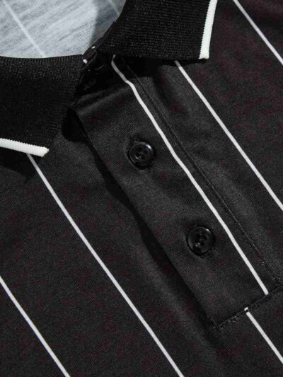 Close-up of a navy blue golf polo shirt. Fine pique knit texture, clean stitching, ribbed collar. Customizable for logo embro