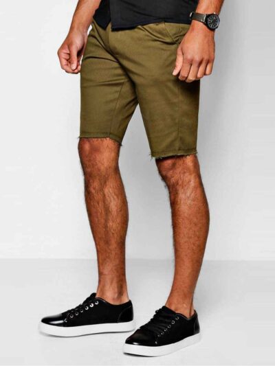 Heavyweight cotton shorts, relaxed fit. Notice the textured fabric, reinforced stitching, and subtle color variations. Casual