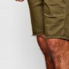 Heavyweight cotton shorts, relaxed fit. Notice the textured fabric, reinforced stitching, and subtle color variations. Casual